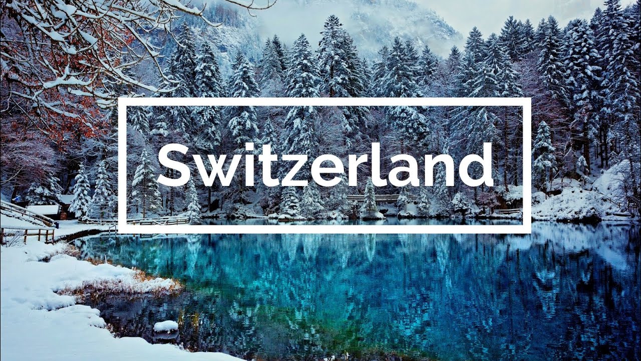 4K Aerial Flight Over Snowy Swiss Alps. Snowy Mountain Peaks, 4K UHD.