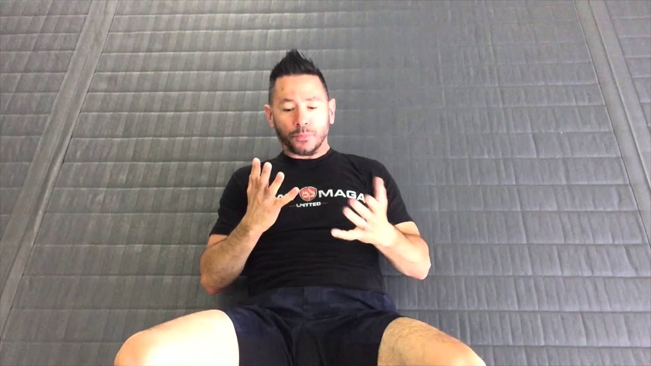 Krav Maga Unyted Orange Belt (backwards fall break)
