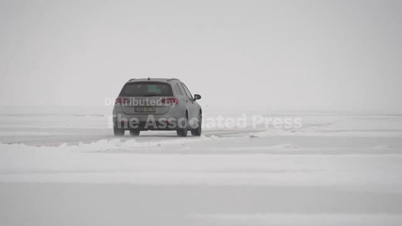 Take a ride across frozen sea on Estonia's 'ice road' - a 20km stretch of frozen sea