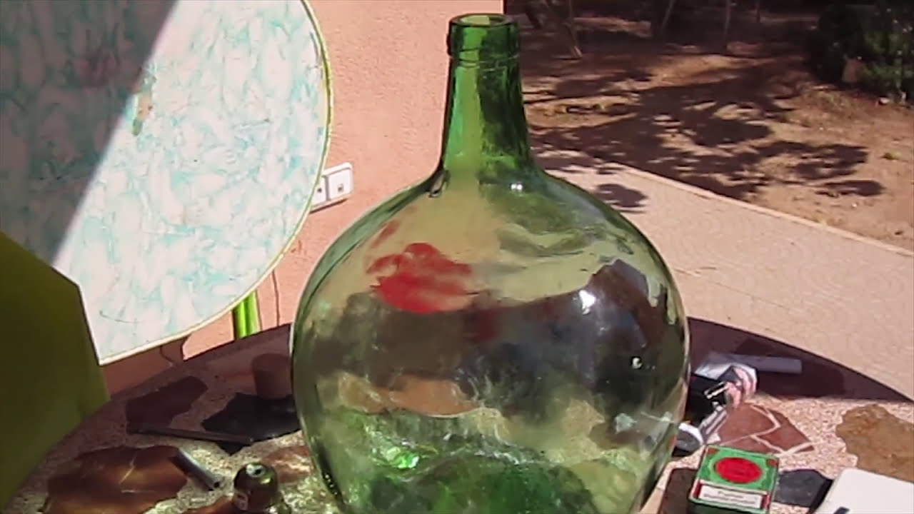 lampara con botellas de vidrio (Damajuana)