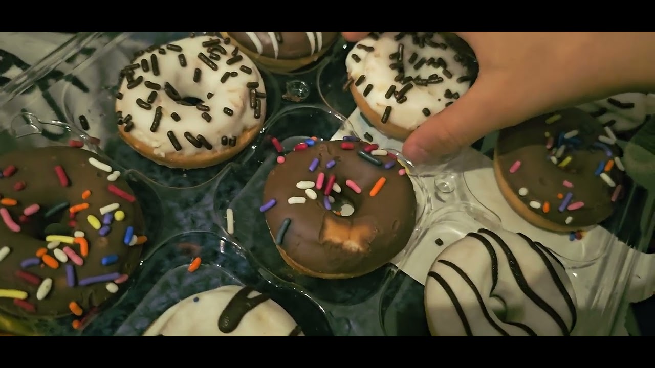 Daily thshow eating donuts 