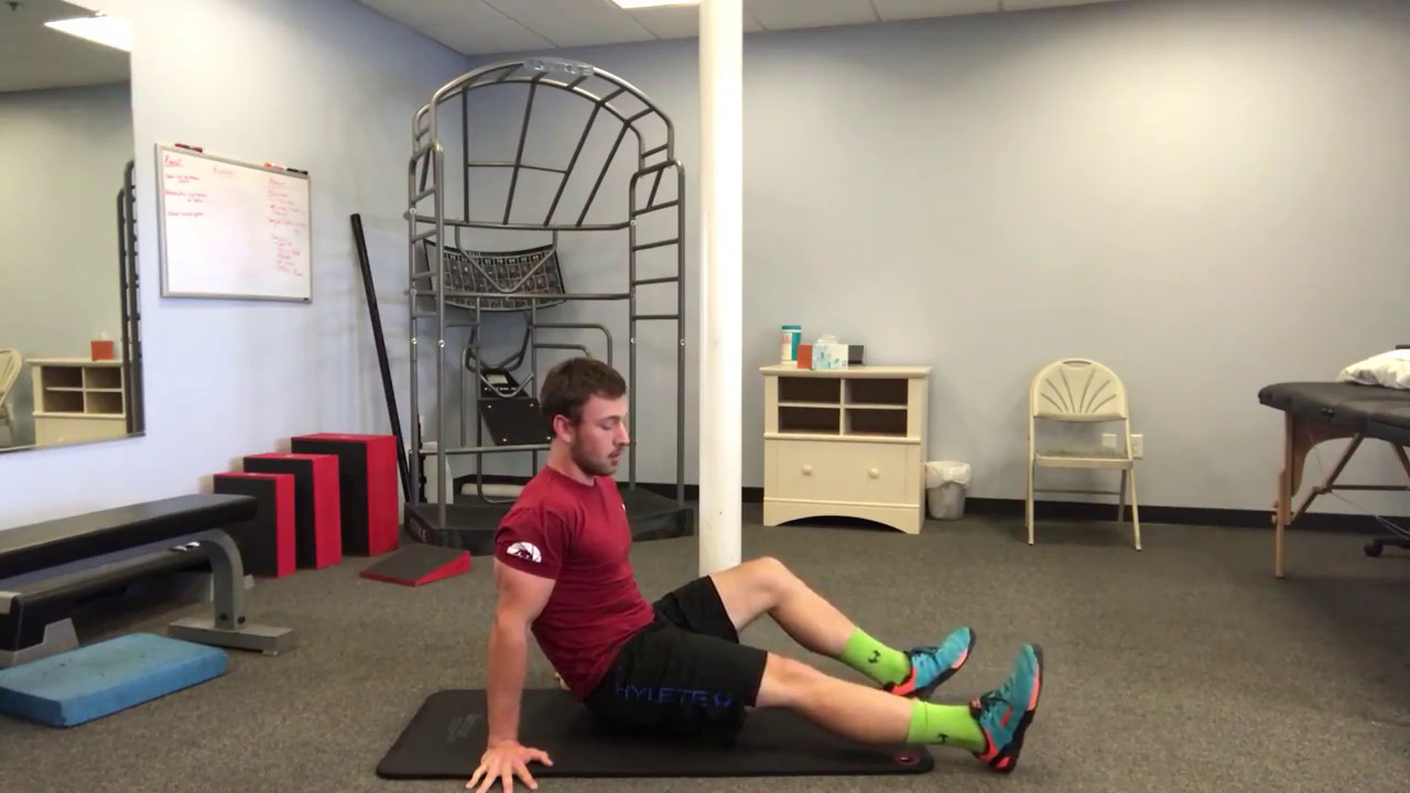 Use the Mobilitas Mobility Sphere to foam roll your hamstrings