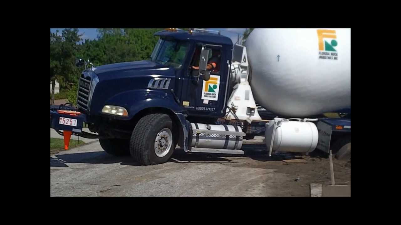 Concrete Truck Loses Tires After Stuck in Mud