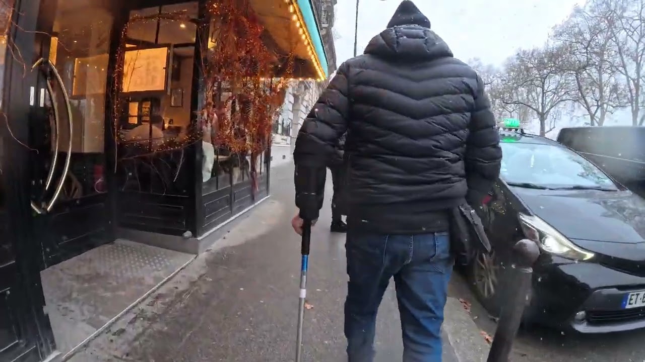 Jan 5,2026.. Walking along Eiffel Tower. Snowy Day!