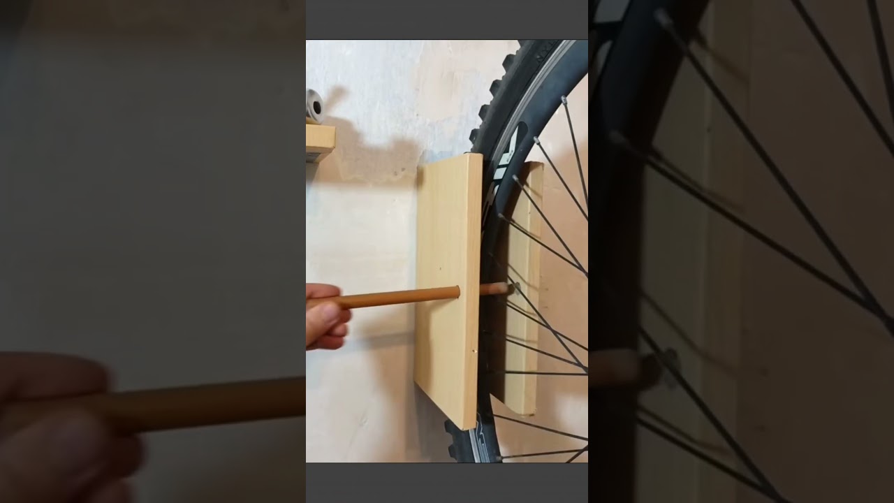 Brilliant DIY idea to make a bike hanger and save space in your home garage 