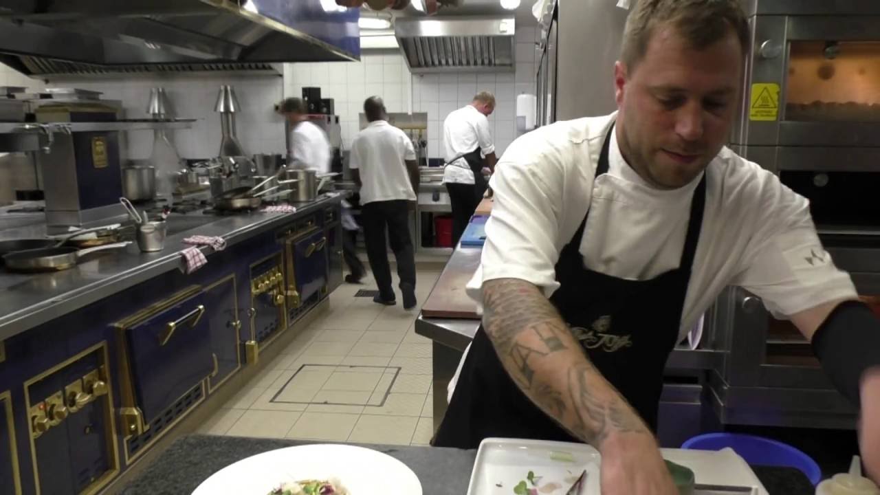 Langmann prepares a hamachi starter in Michelin star Vila Joya
