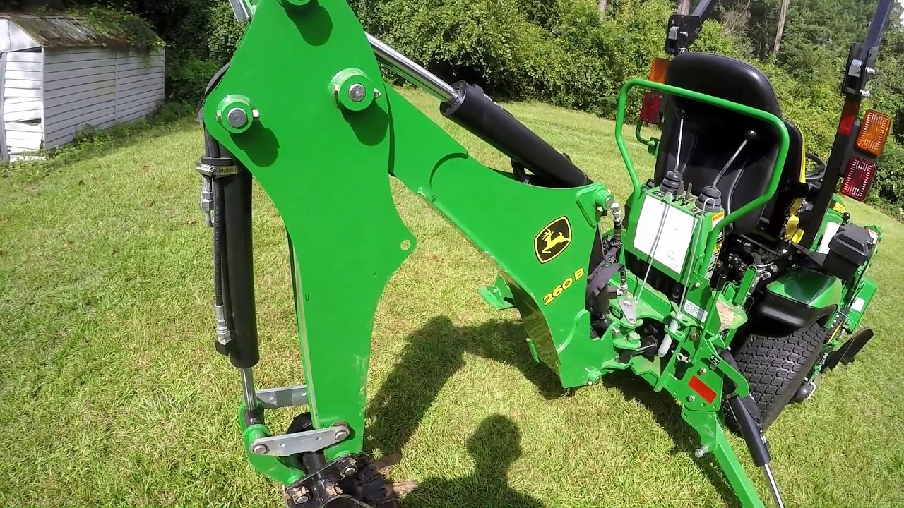 260B backhoe removal and install on JD 1025R