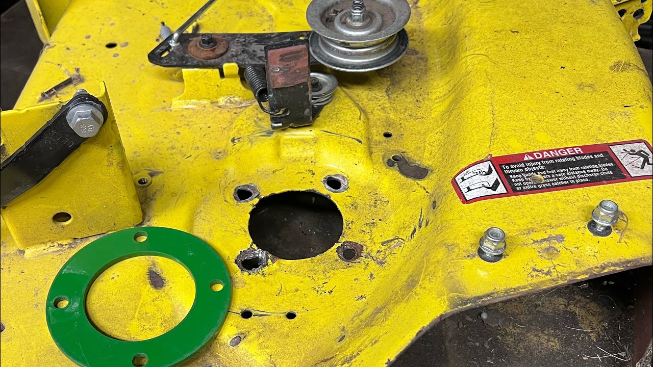Installing a John Deere 100 series deck repair ring. How to get it centered. Weld it in place