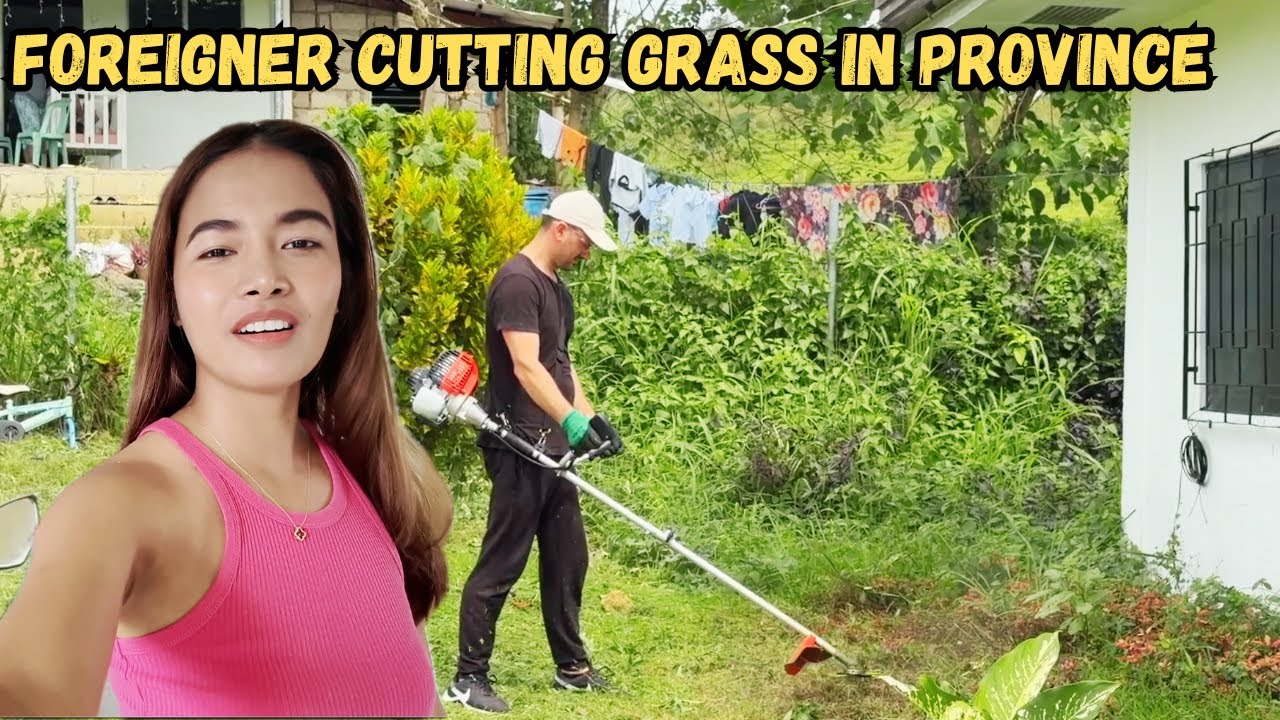 Foreigner Cutting Grass In The Province