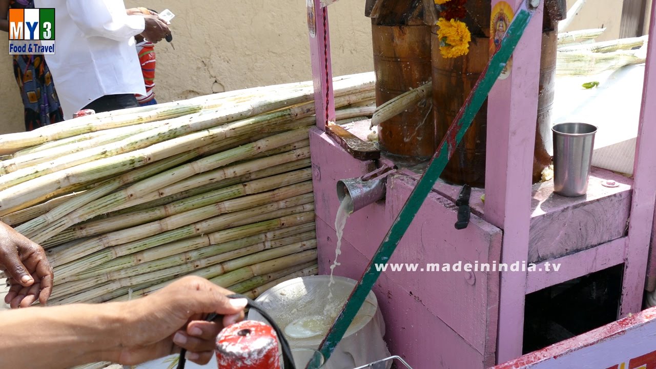 SUGAR CANE JUICE EXTRACTING WITH TRADITIONAL WOOD MACHINE | STREET FOODS IN INDIA