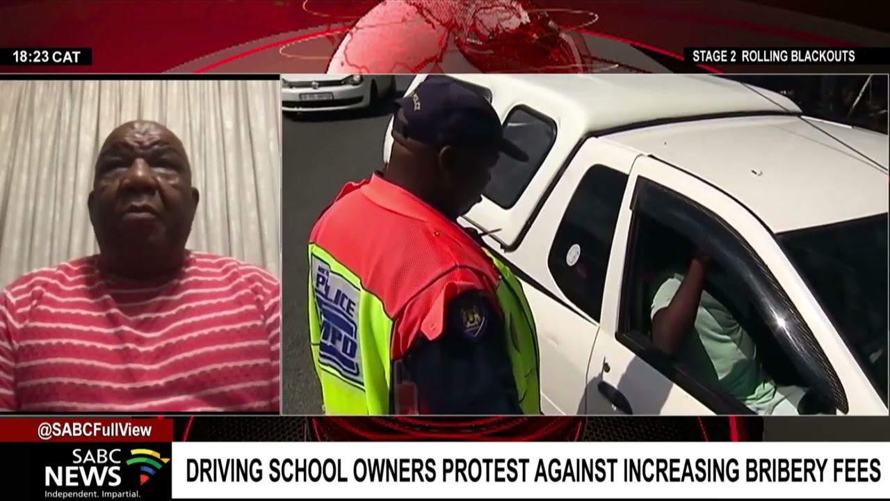 Driving school owners protest against traffic officials increasing bribery fees