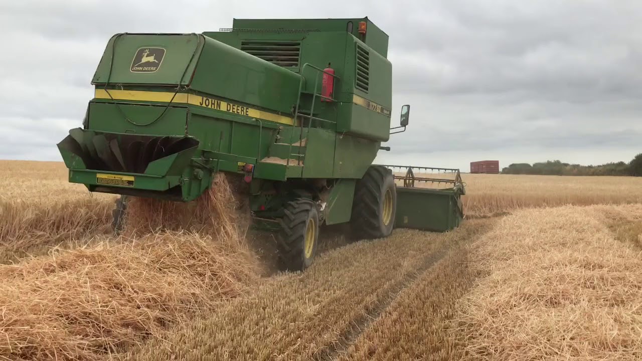 John Deere 1177 Harvesting Field Of Barley