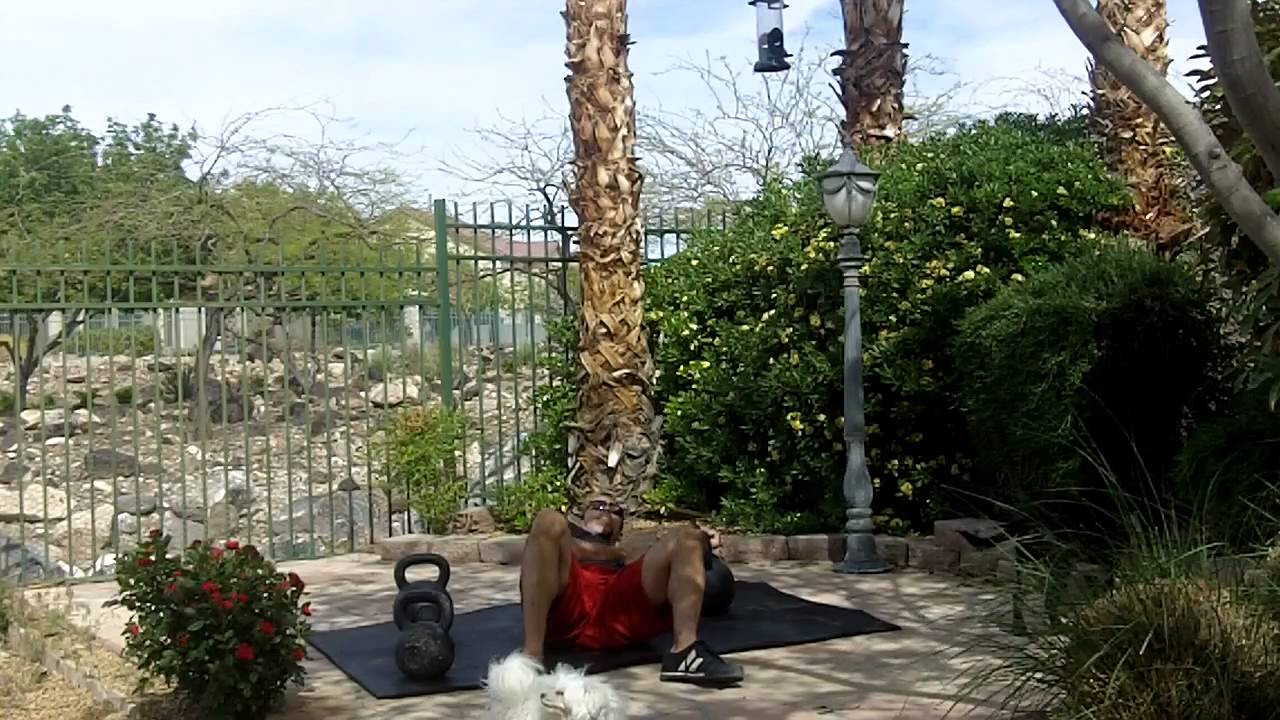 Rolling Kettlebell Floor Press for conditioning circuit by Mike Mahler
