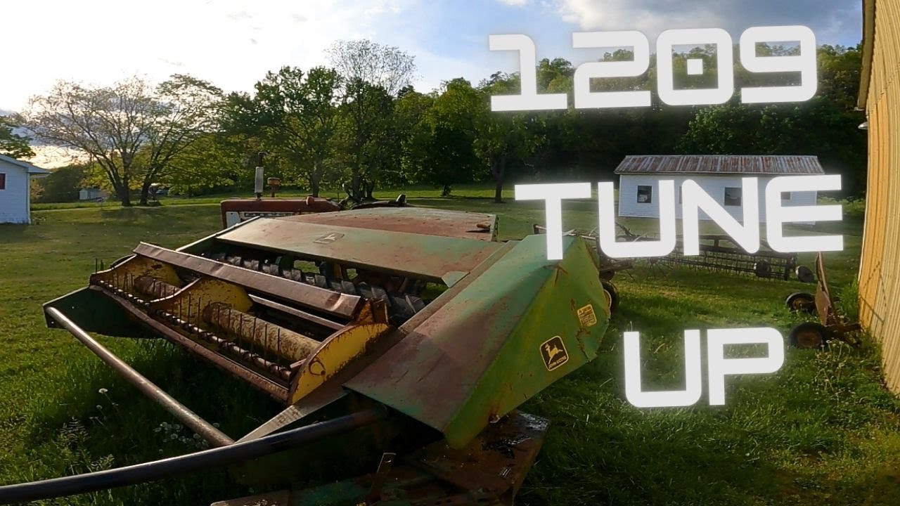 Abandoned JD 1209 Haybine preperations