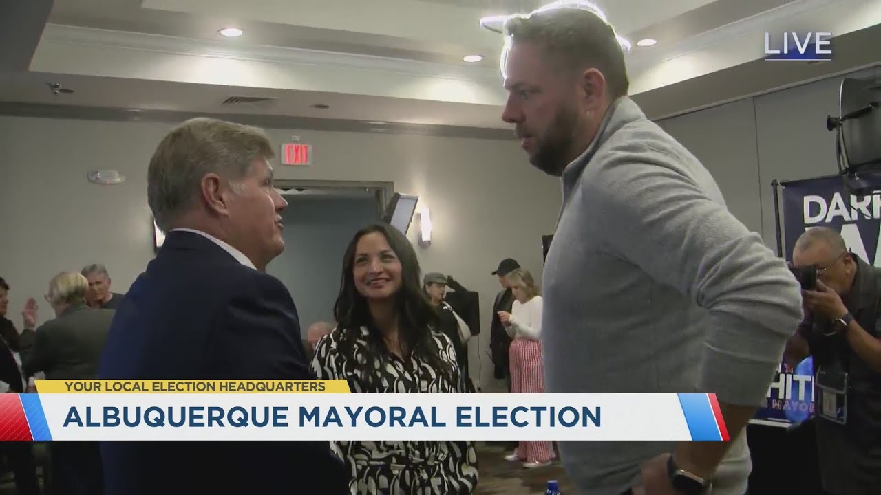 Darren White talks with supporters while awaiting Albuquerque mayoral election results