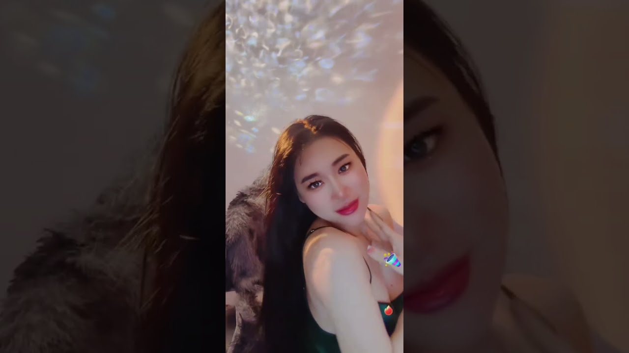 Luscious Asian Doll in Green Satin Dress Dances with Downblouse and Smiles Livestream