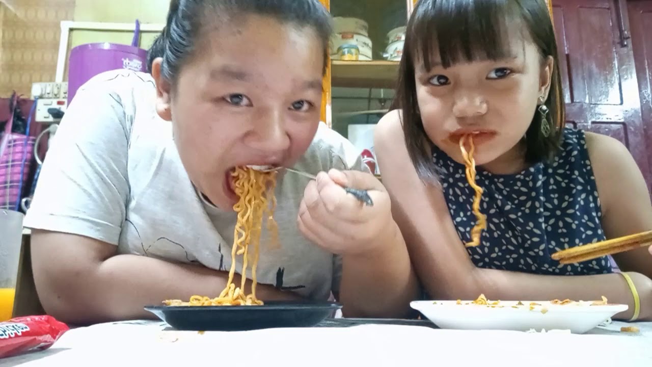 eating spicy noodles challenge with my cousin