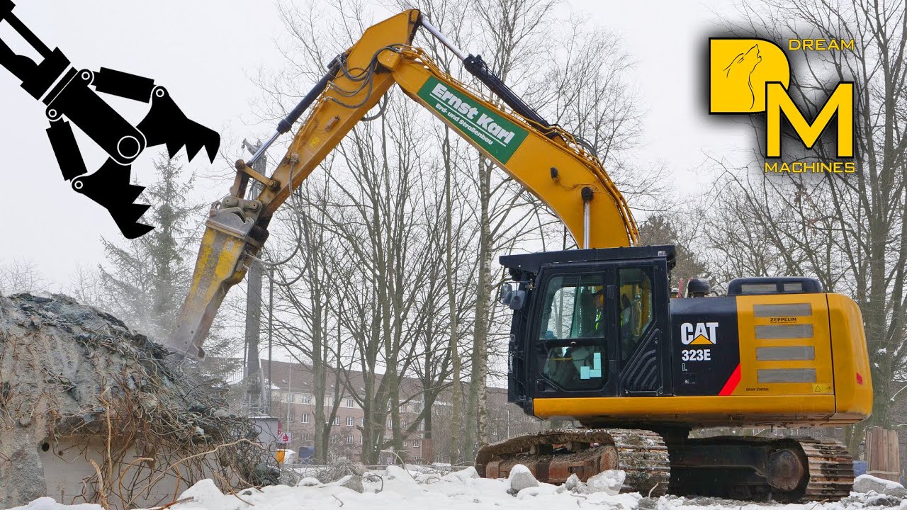 CATERPILLAR 323E BAGGER BUNKER ABBRUCH MIT HYDRAULIKHAMMER BAUSTELLE DREAM MACHINES