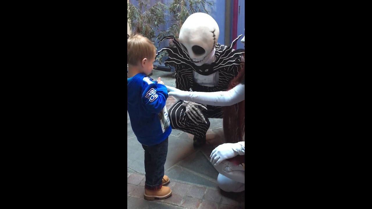 Toddler meets Jack Skellington and Sally for the first time