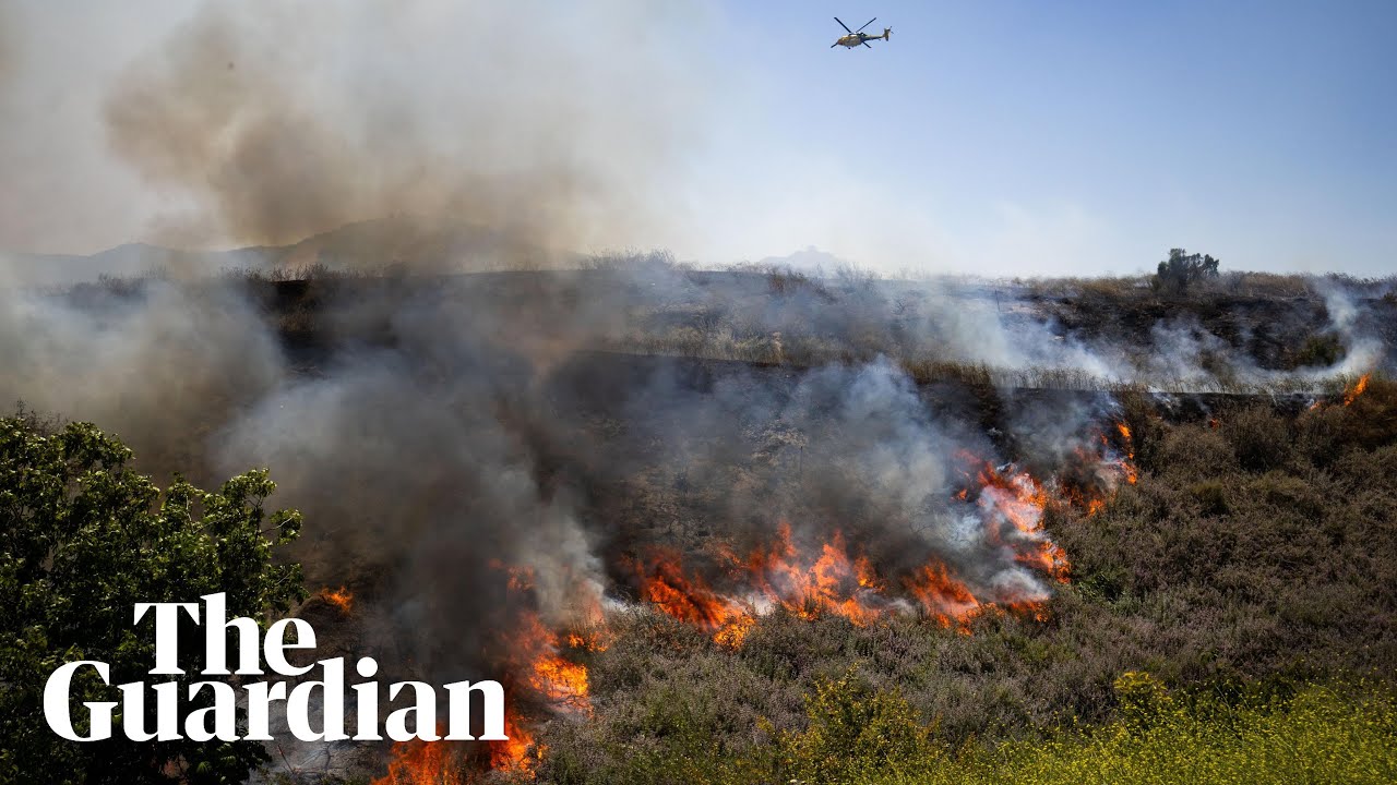 Aerial footage shows California brush fire spreading across Simi Valley