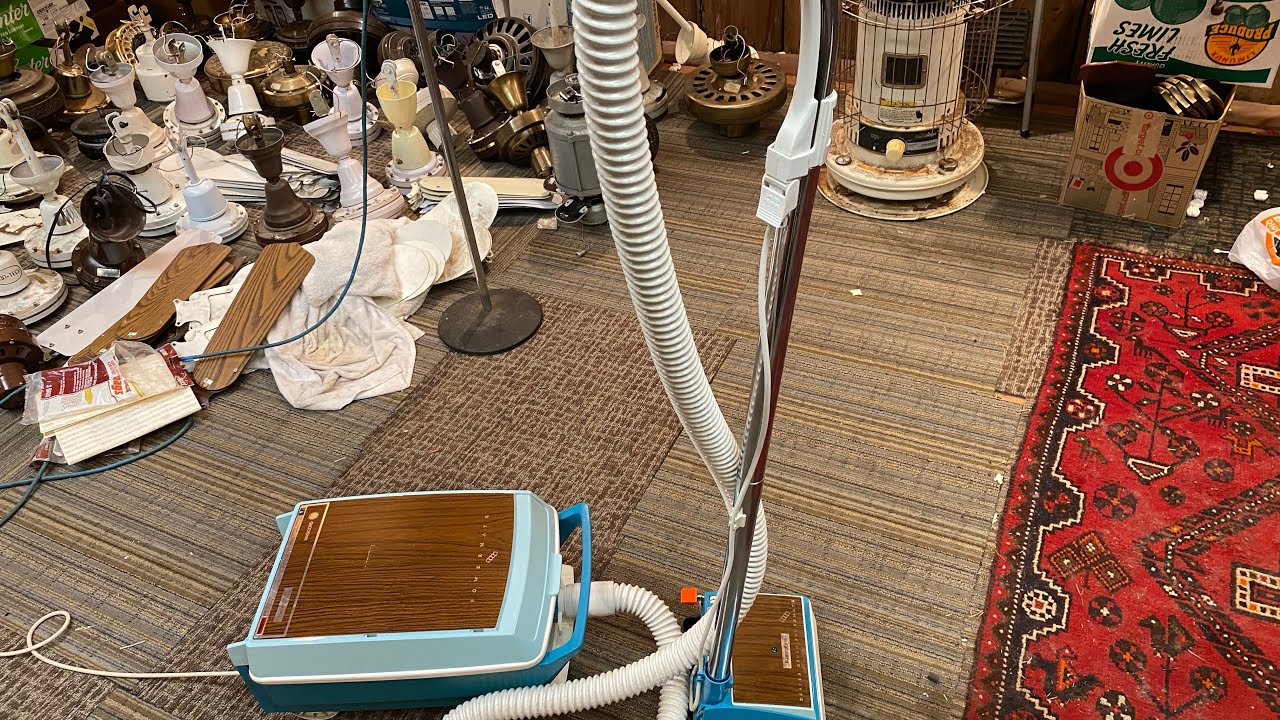 Kenmore Powermate Magicord suitcase canister vacuum in two tone teal blue