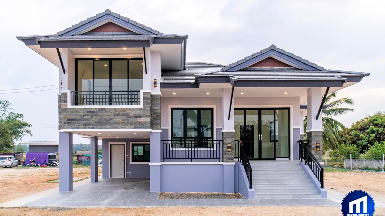 บ้านชั้นครึ่งสไตล์ไทยประยุกต์ สวยงามโดดเด่น หลังคาจั่วด้านหน้าโทนสีเทาเรียบหรู 4 ห้องนอน 3 ห้องน้ำ