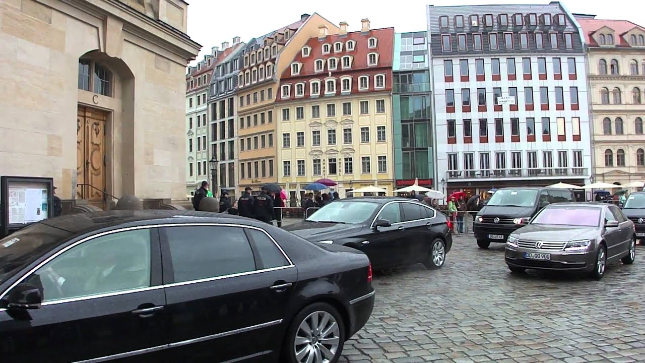 Caravan moves with Queen Beatrix in front of Frauenkirche Dresden