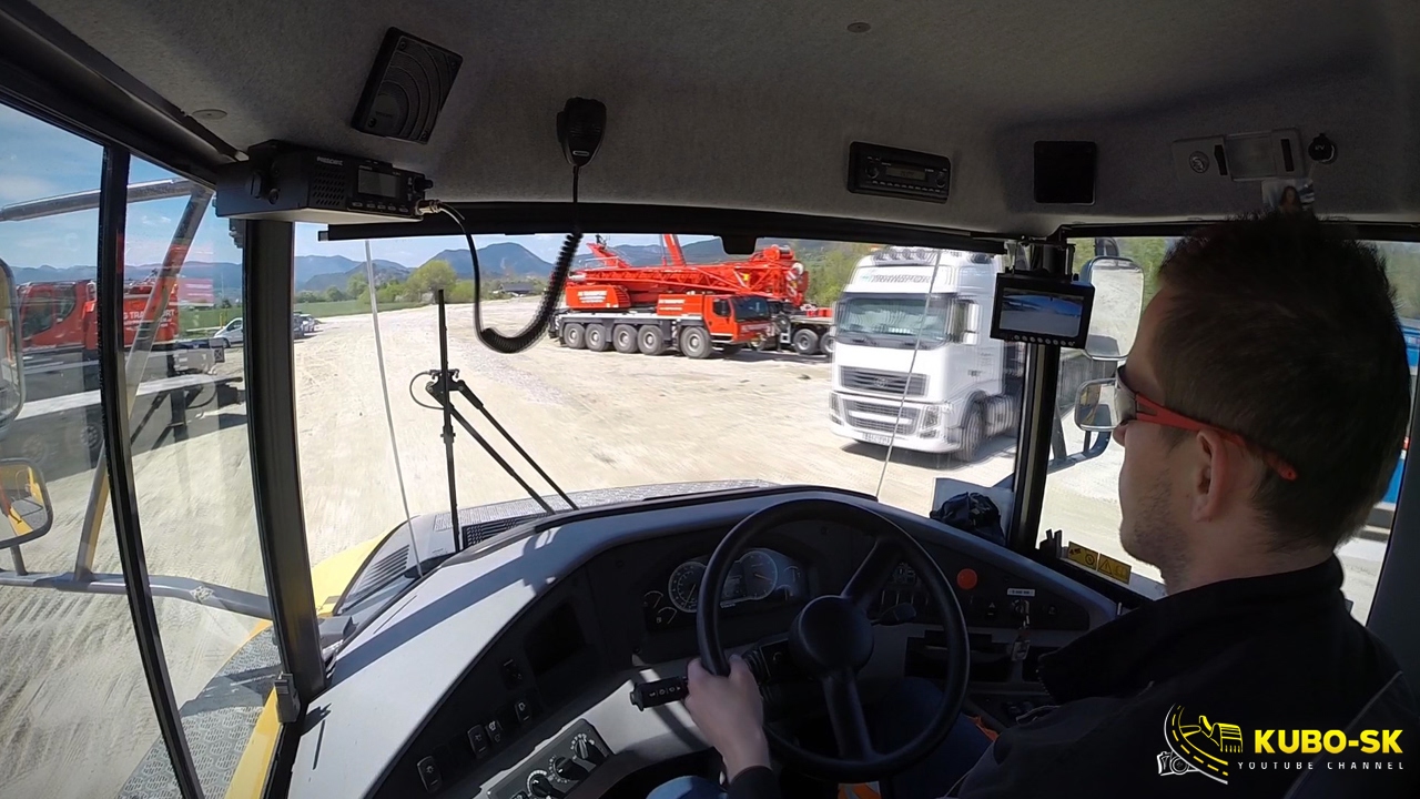 Volvo A30G drives on construction site - dumper cab view