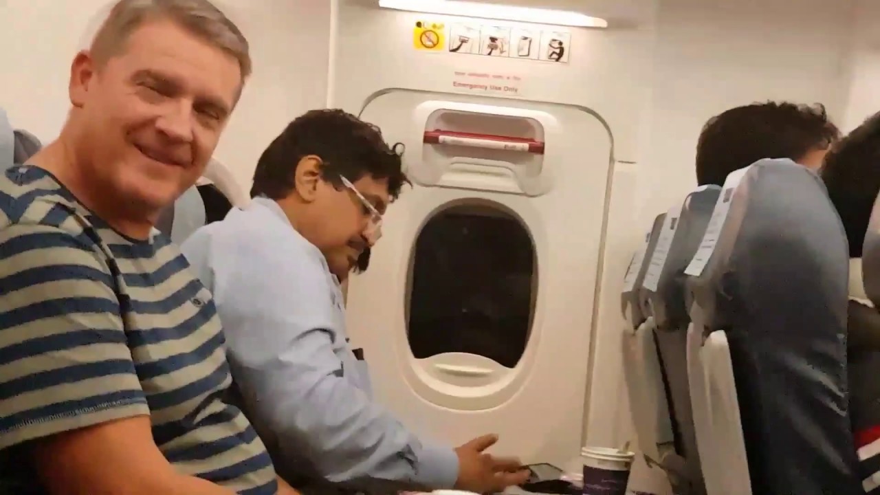 Plane Rage! Peter Rosenfeld films a passenger losing it.