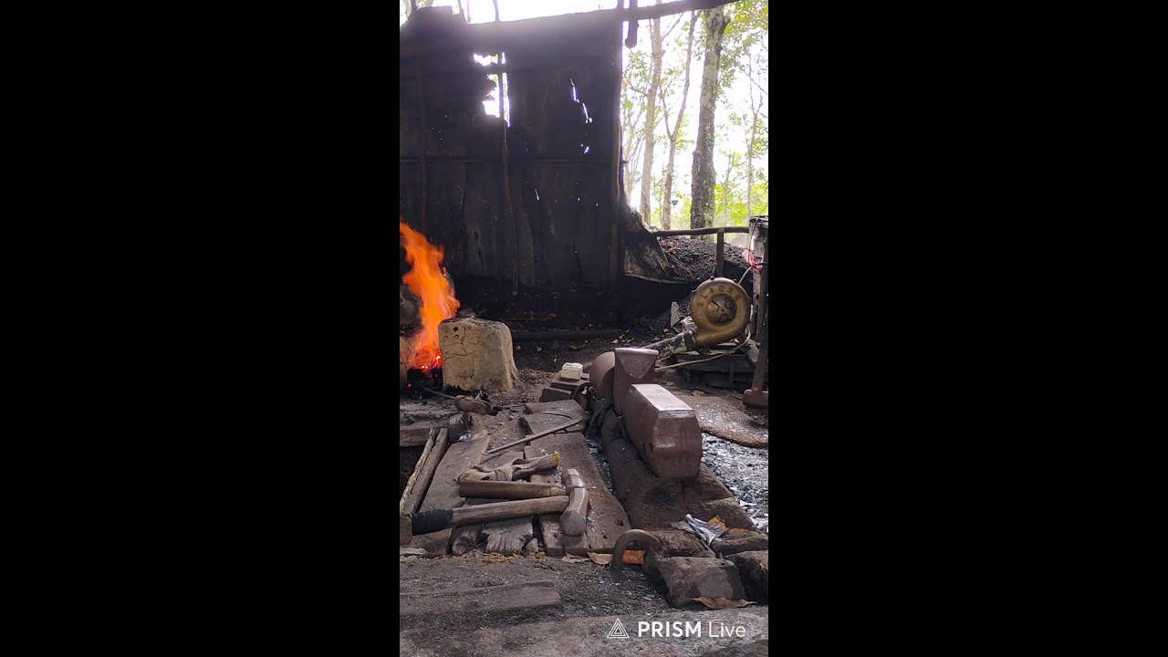 pembuatan arit sawit