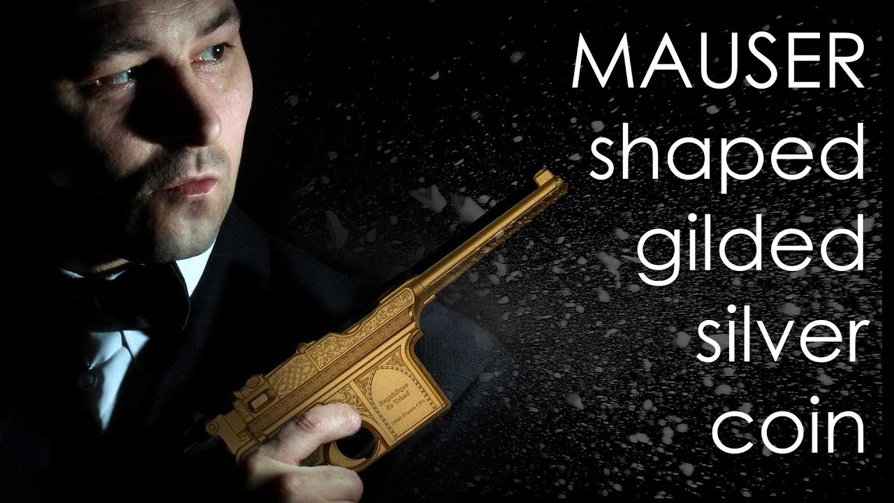 The famous German Mauser pistol  donates its shape to a new gilded silver coin