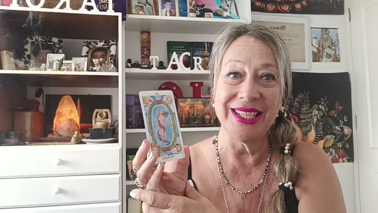 Mundo y 10 de Espadas