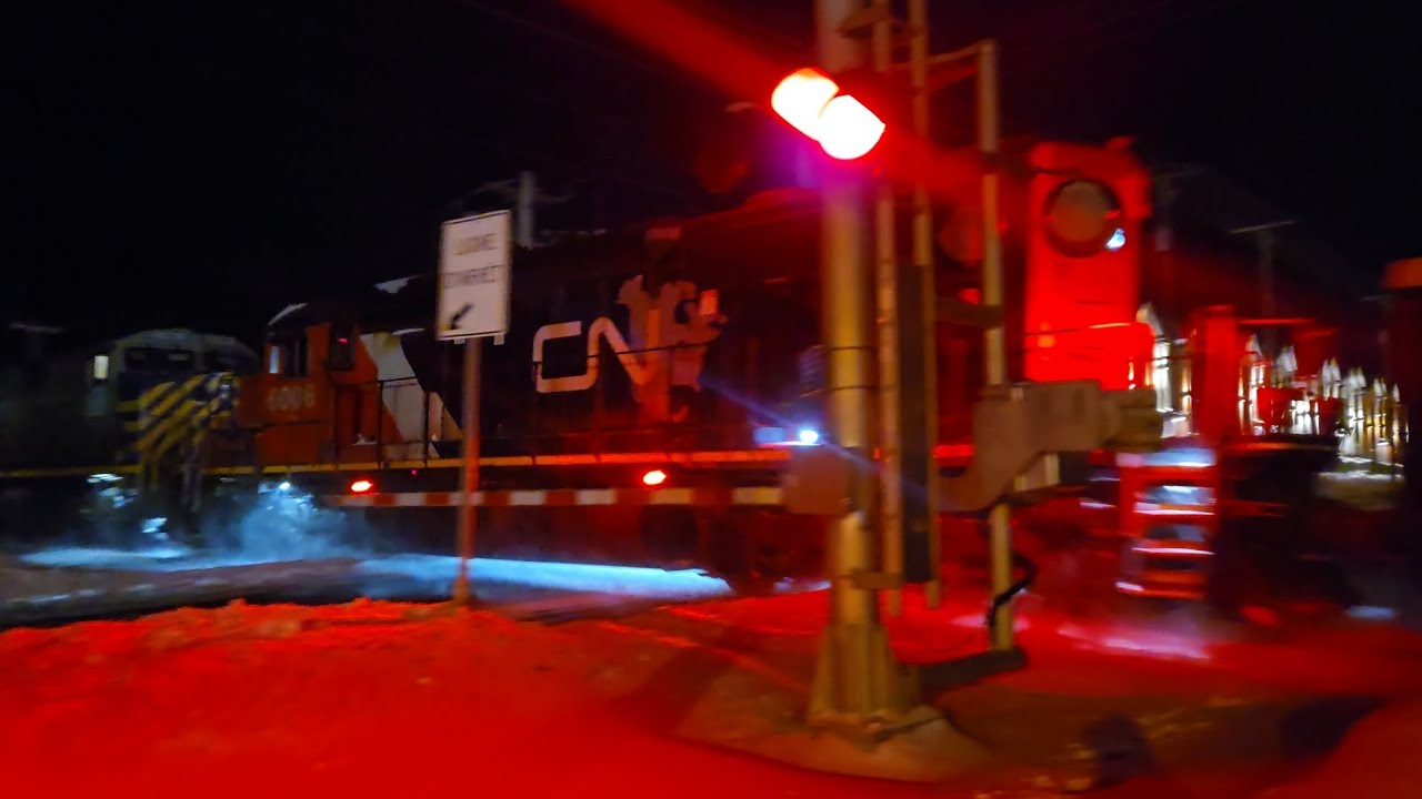 CN M368-31 North with CN 6006 trail 3 and horn salute 2026-02-08