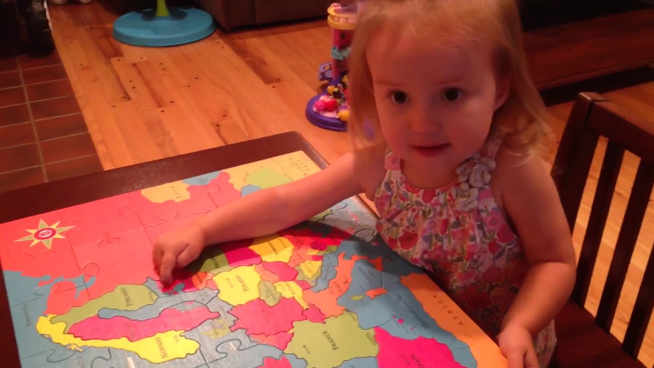 Brielle having fun with a puzzle map of Europe! ( 2 1/2 years old at the time)