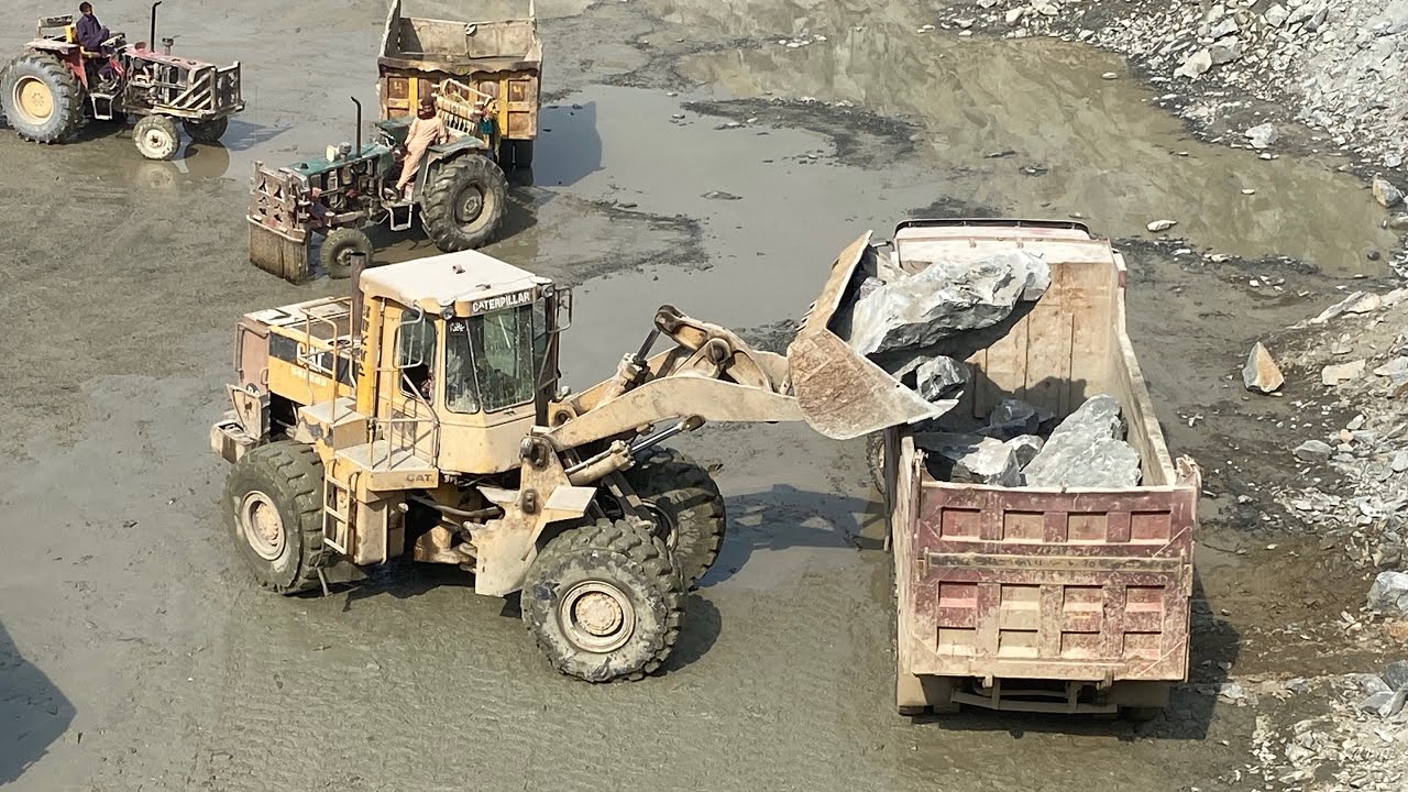 Power of  Giant: CAT 966D at WorkDangerous Loading? Massive Boulders in HOWO 336💯