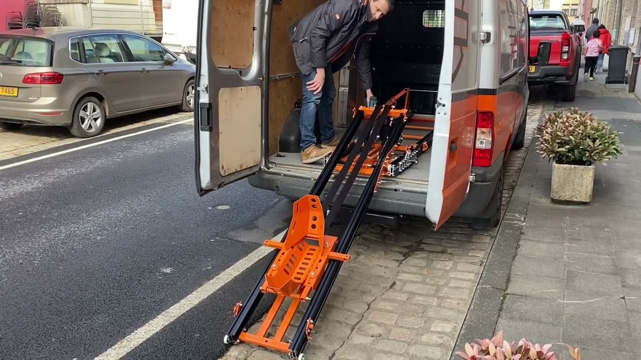 Neo-Dyne ramp motorcycle loading system in a van - syst&egrave;me de chargement moto dans une camionnette