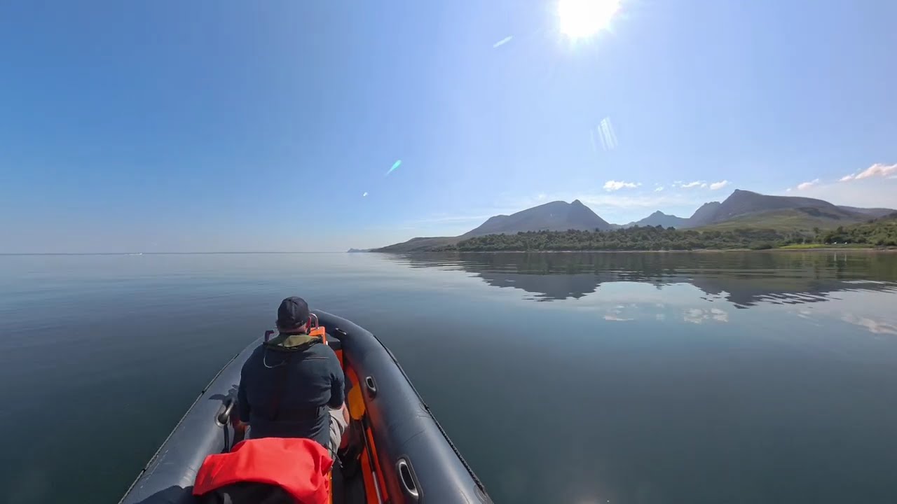 Avon Searider SR4 squeezing 32 knots along the Arran coast in the Firth of Clyde.