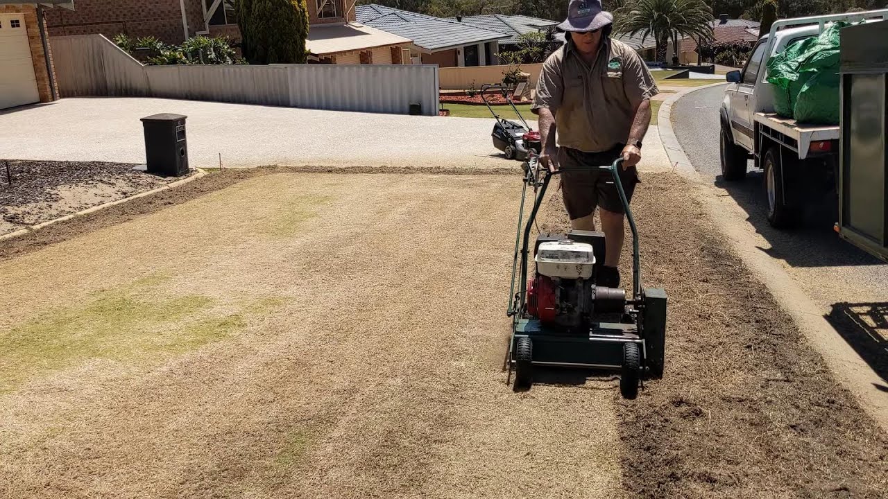Scarifying Vertimowing a Dry Lawn