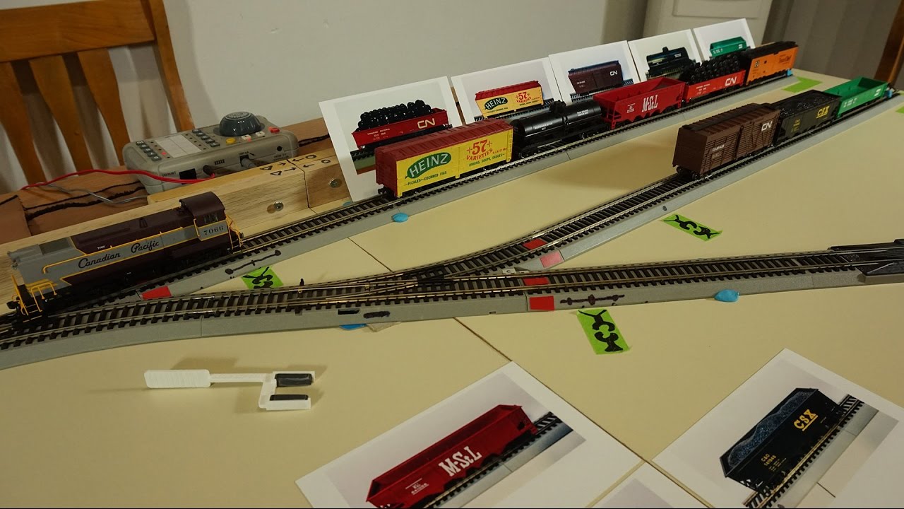 Inglenook train shunting puzzle / puzzle de triage ferroviaire