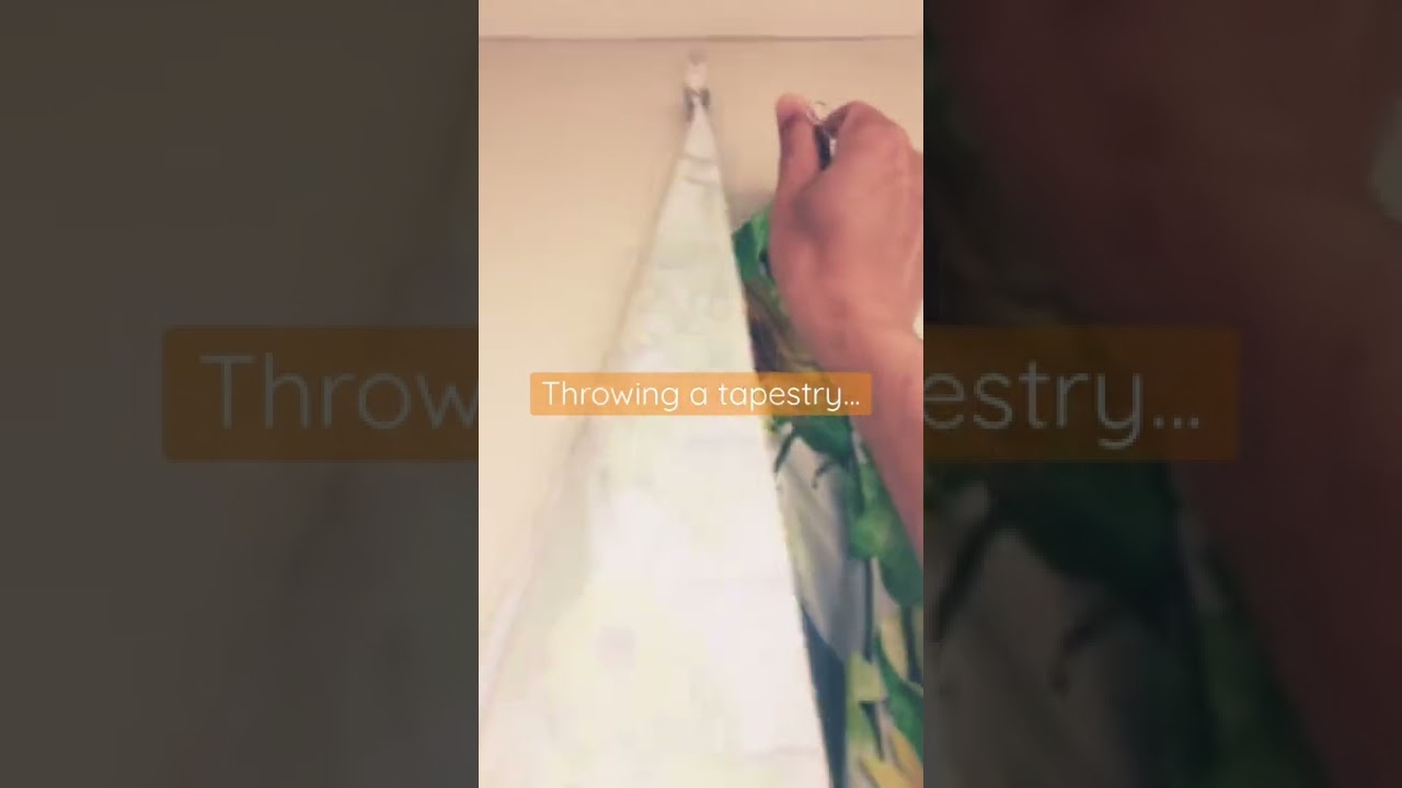 Boring wall? Throwing a tapestry.