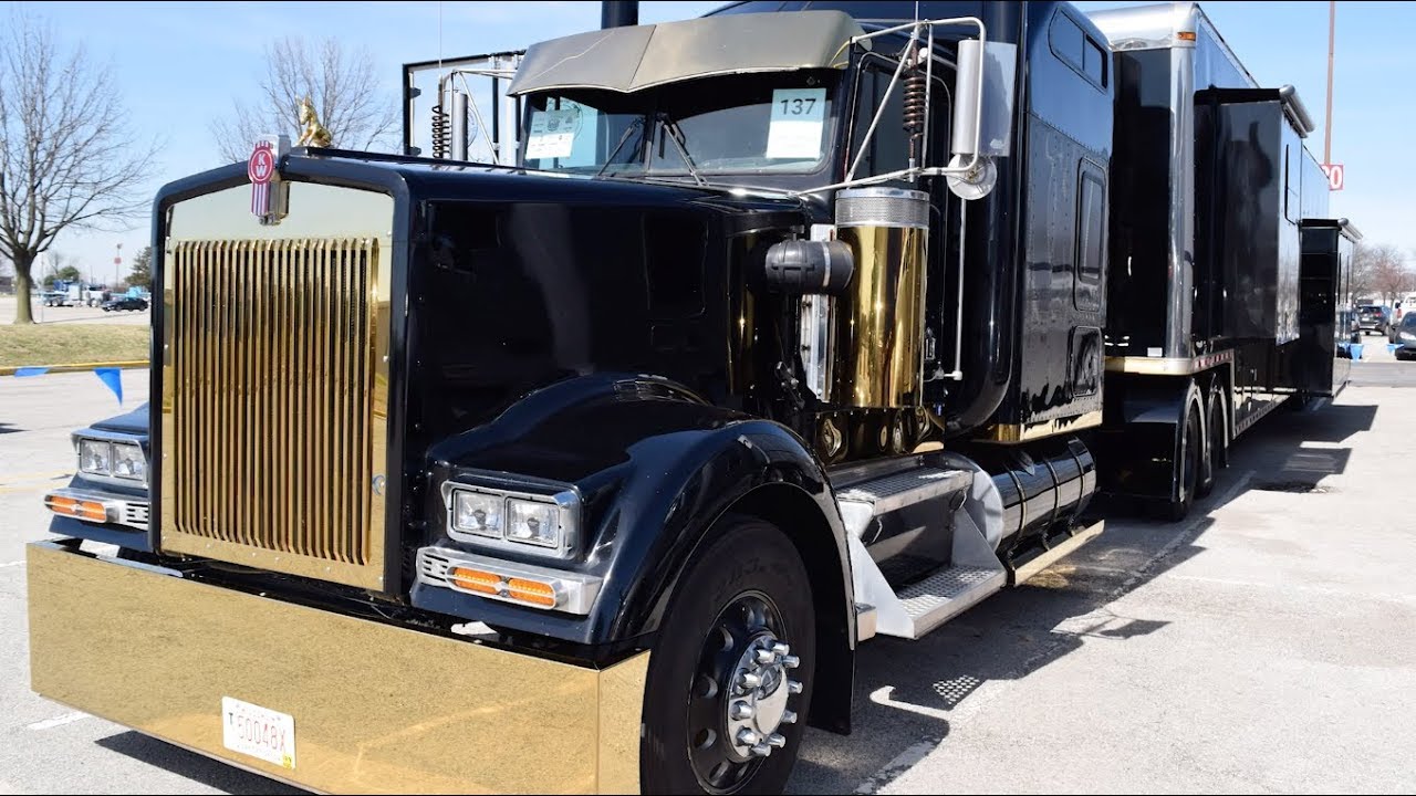 Badass Trucking and Badass RV's 1995 KenworthW900 and custom RV trailer