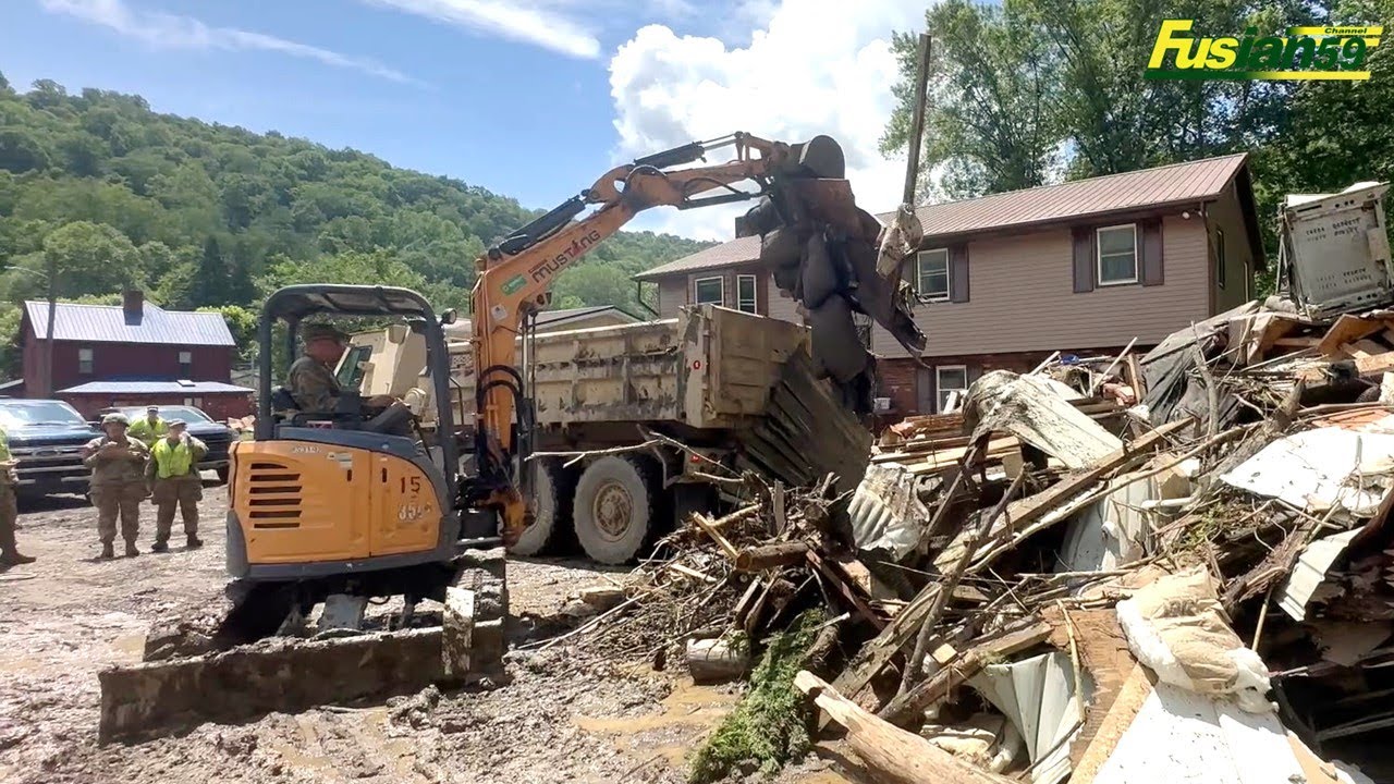 Mini Excavator Yanmar Vio30 6B and Mustang 350Z conduct flood recovery near West Virginia