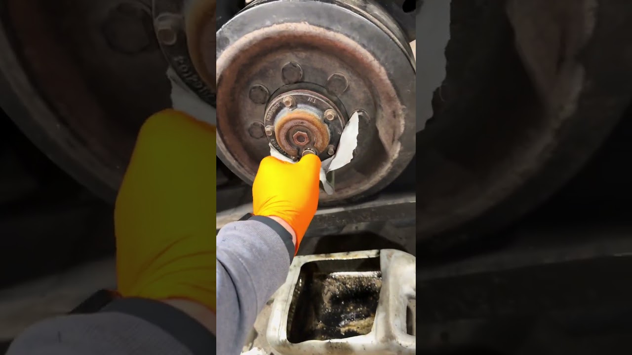 How i Do Yearly Bogie Wheel And Reaction Arm Oil On CAT Challenger Track Tractors