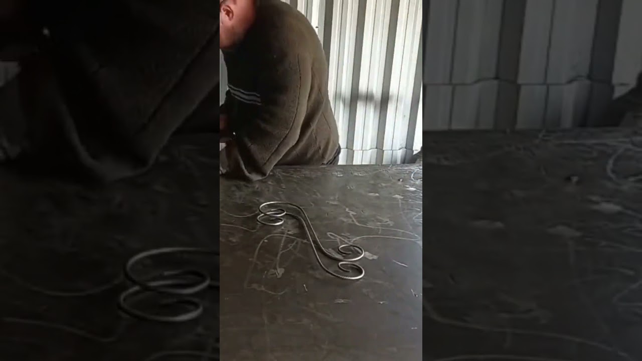 arte em ferro volutas floreira de parede