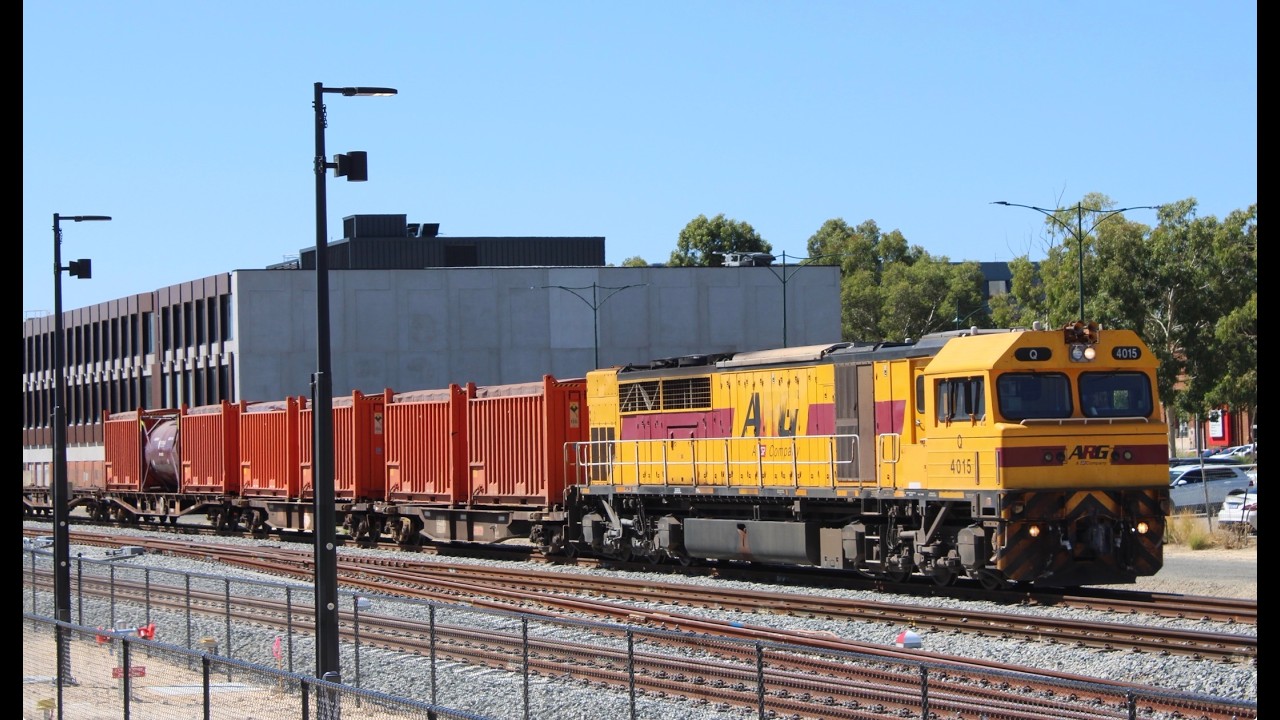 At Midland station, for the opening, with passing 7430 Sulphur train with Q4015.