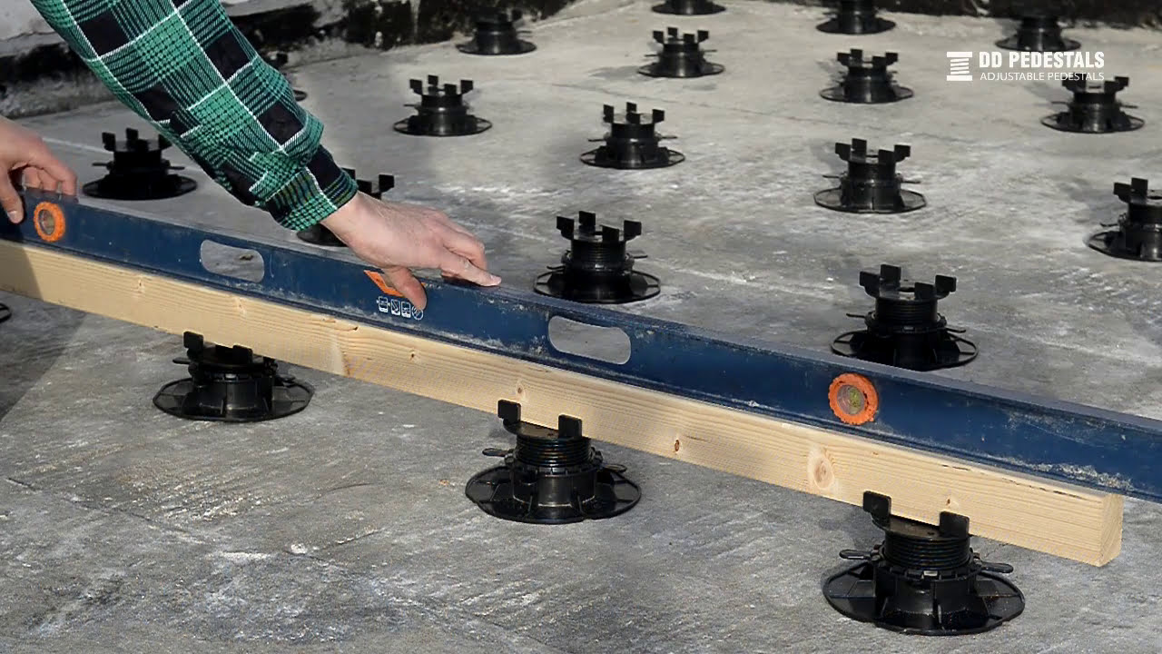 Adjustable pedestals ventilated terrace installation