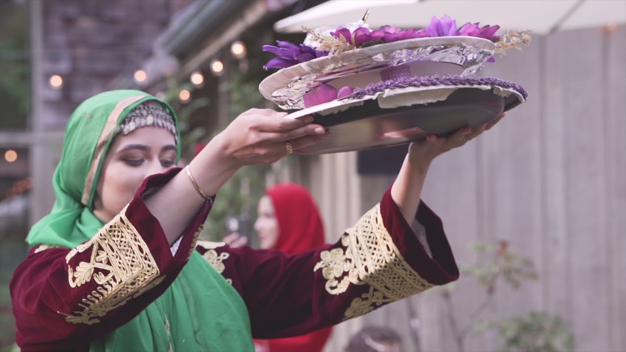 A whimsical Afghan henna party in a garden