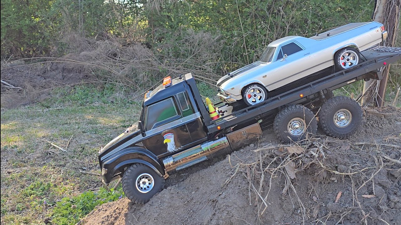TRAXXAS TRX6 ULTIMATE HAULER one of the coolest RC machines out there, hauling the KYOSHO El Camino