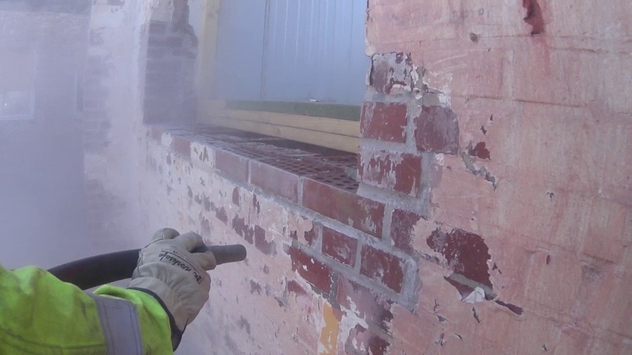 Soda blasting brick wall