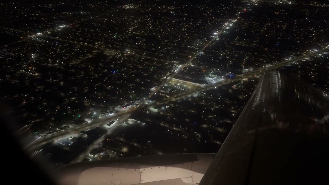 Night arrival into Detroit on an A320 with lake & city views